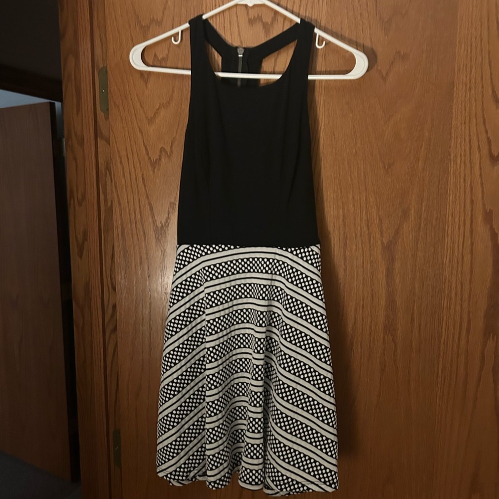 Fun Summer Black and White Women's Dress with Orange Band Detail In Back.
